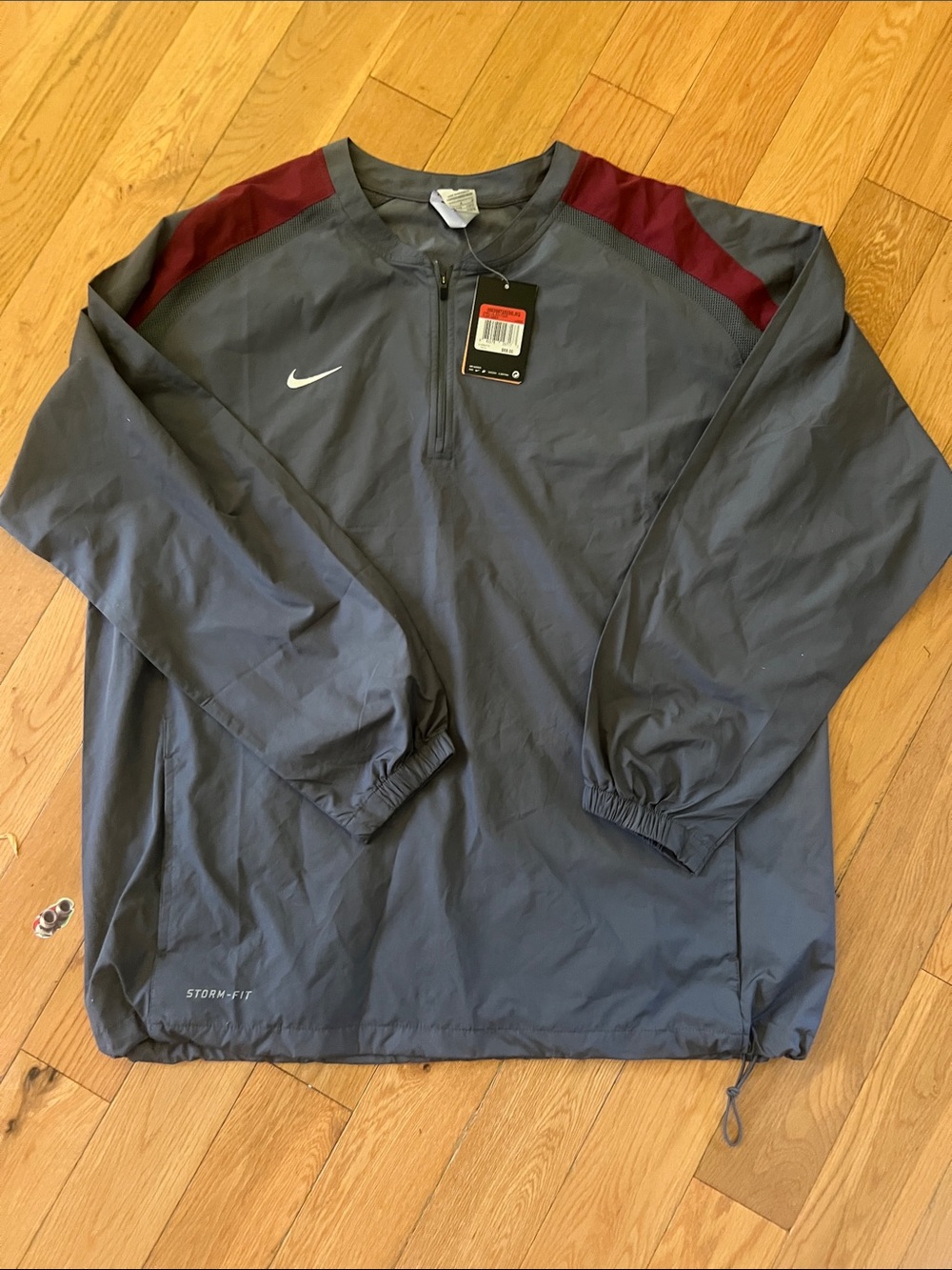 Nike Men’s Gray Windbreaker with Burgundy Shoulder Panels